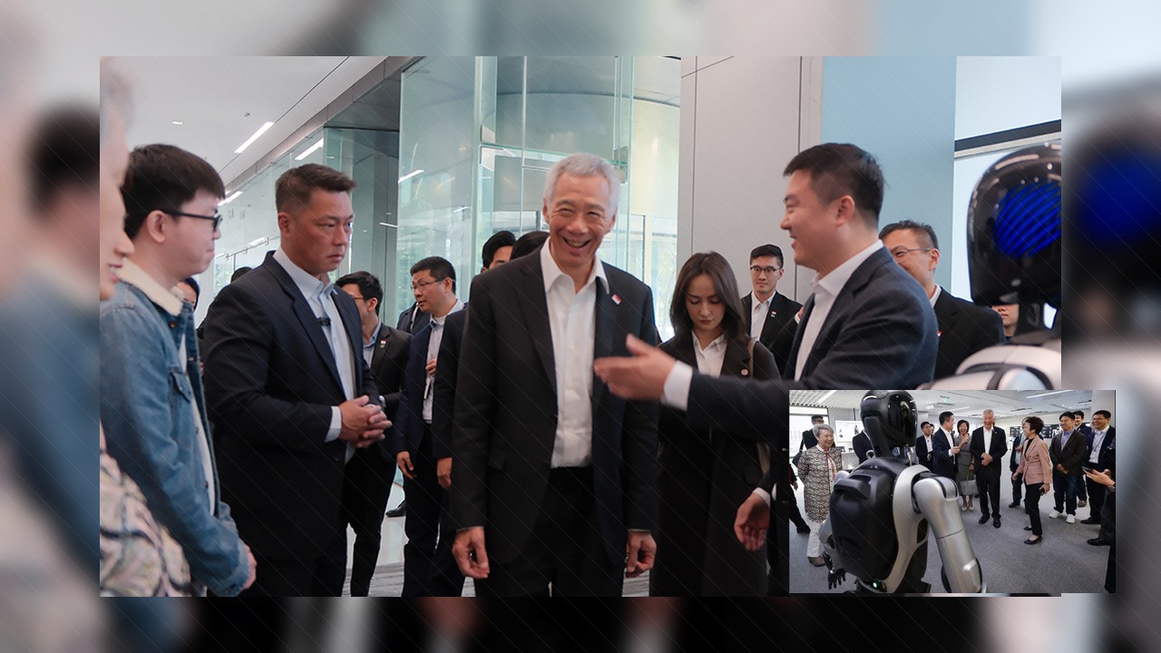 J9九游会 新加坡高级部长李显龙参观J9IBOT｜J9九游会科技资讯配图